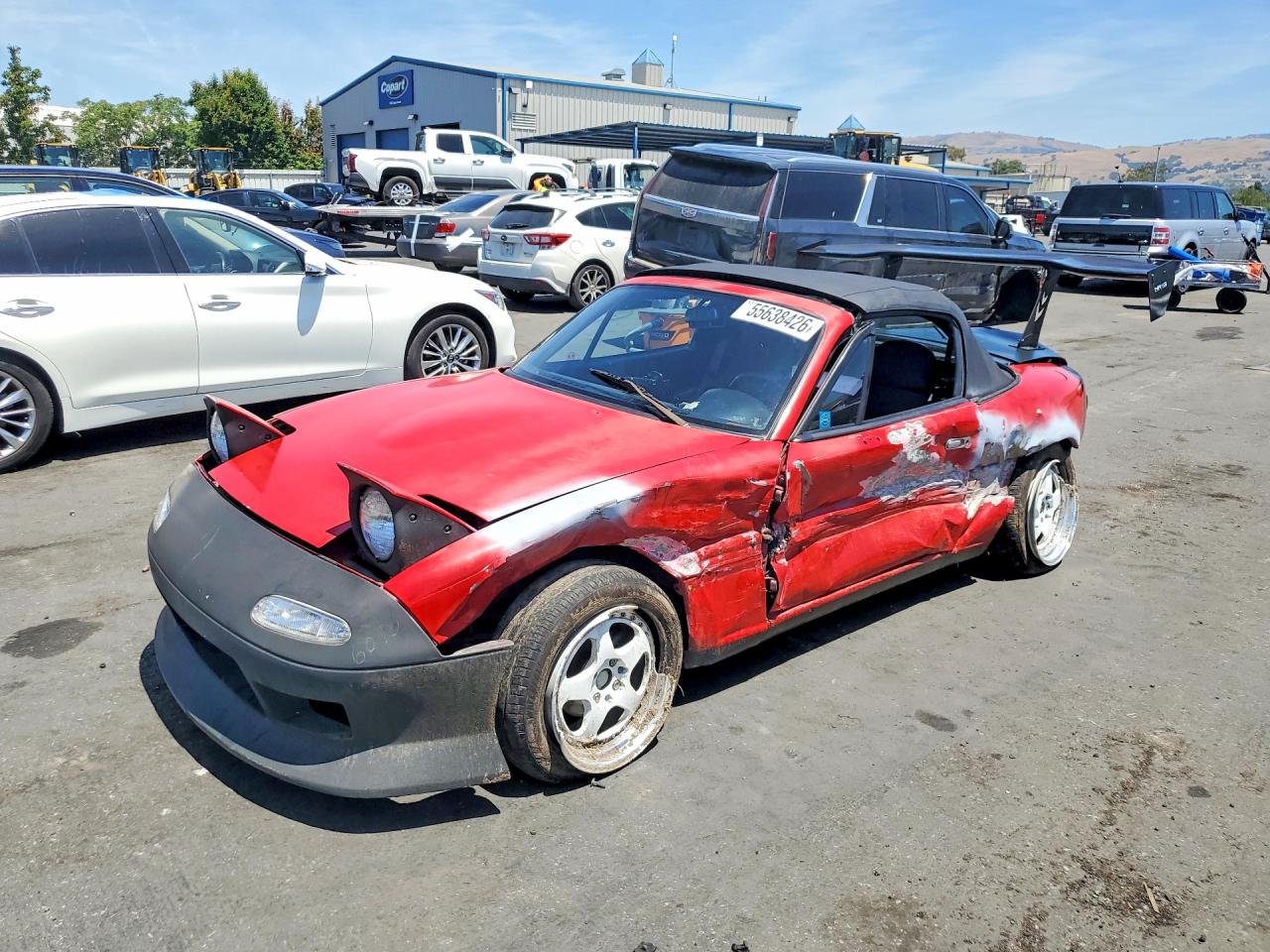 1990 Mazda MX-5 Miata, VIN JM1NA3517L0127953 — Side