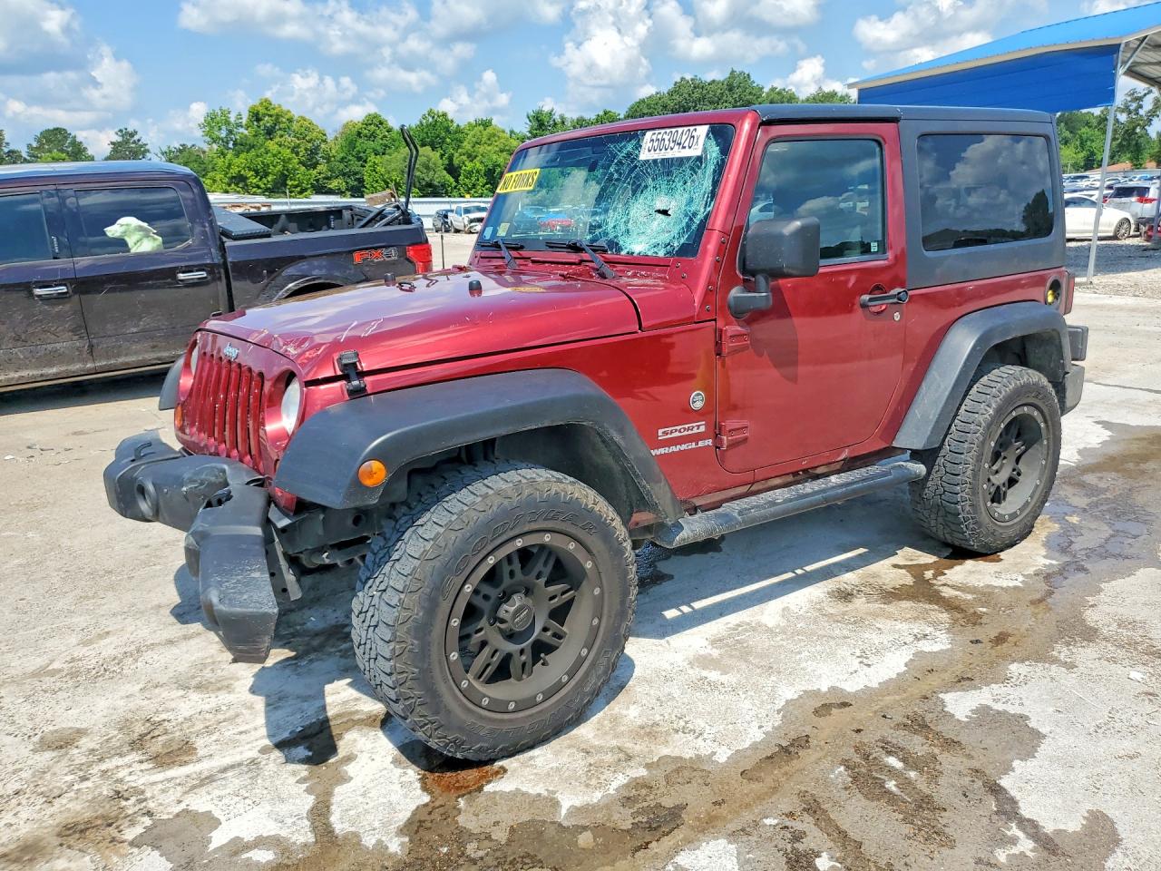 2012 Jeep Wrangler Sport, VIN 1C4AJWAG2CL184599 — Front end