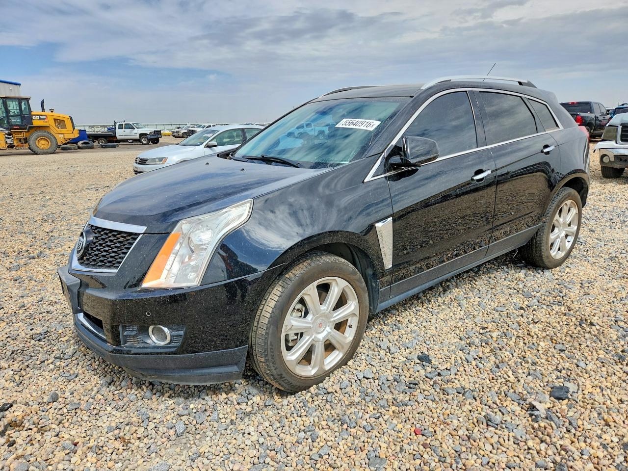 2015 Cadillac SRX Performance Collection, VIN 3GYFNCE35FS542769 — Град