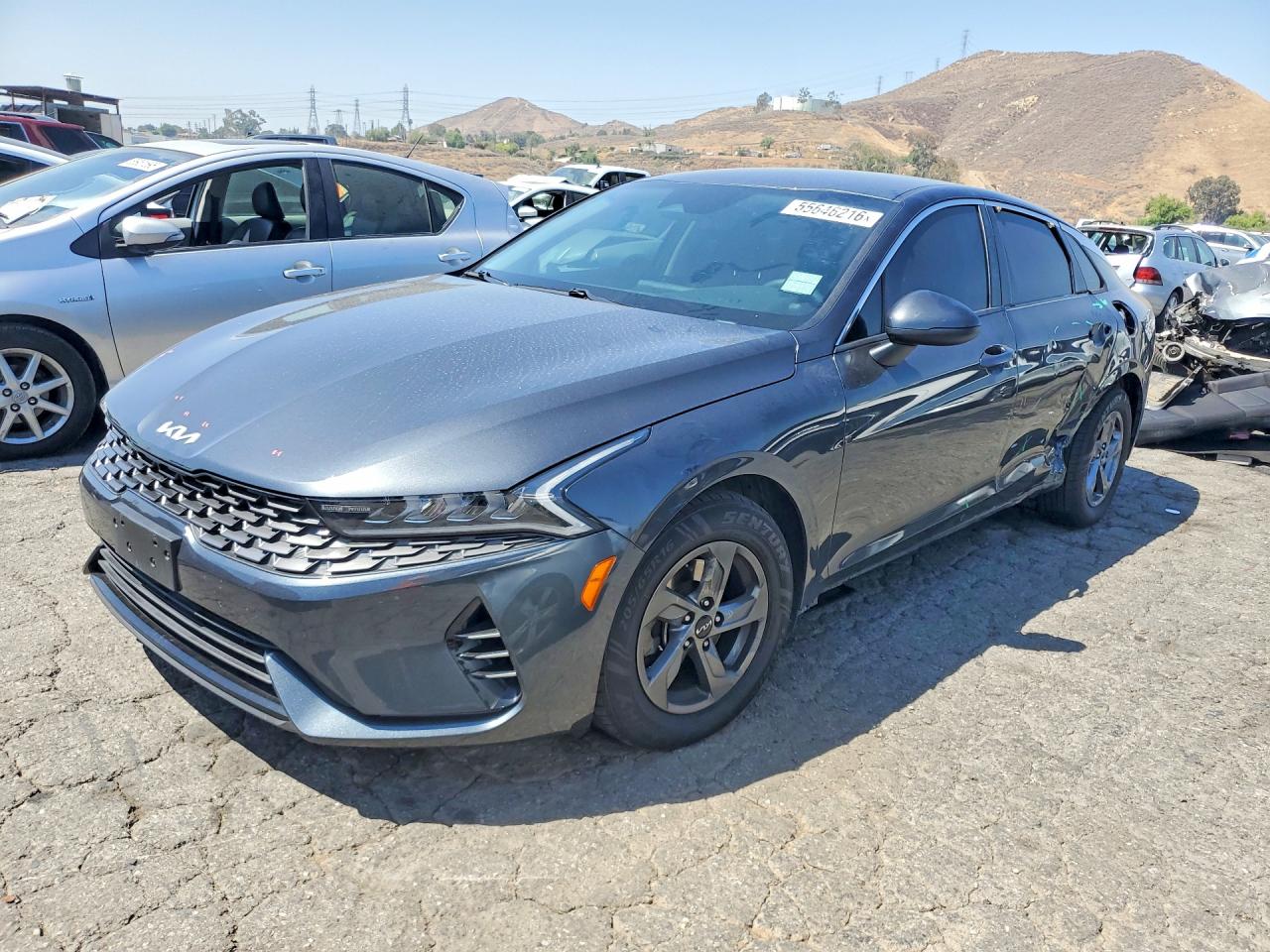 2023 Kia K5 LXS, VIN 5XXG14J21PG191990 — Side