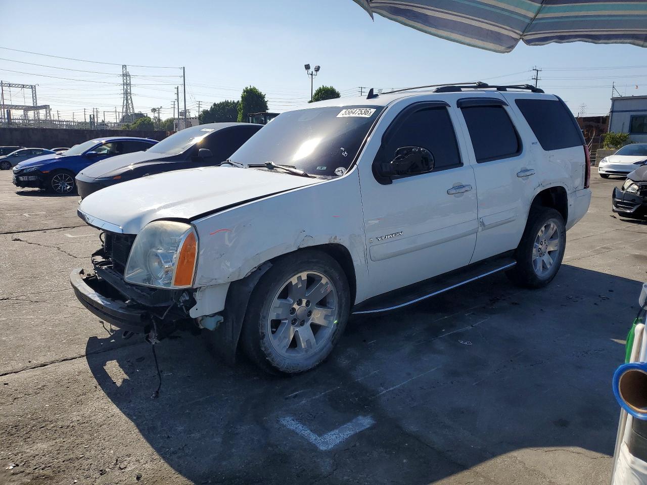 2009 GMC Yukon SLT 4SA, VIN 1GKFC33089R128031 — Front end