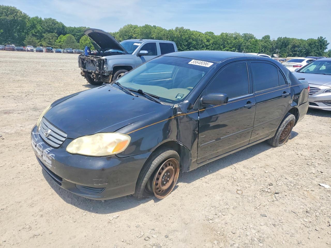 2003 Toyota Corolla CE, VIN 1NXBR32E13Z076036 — Side