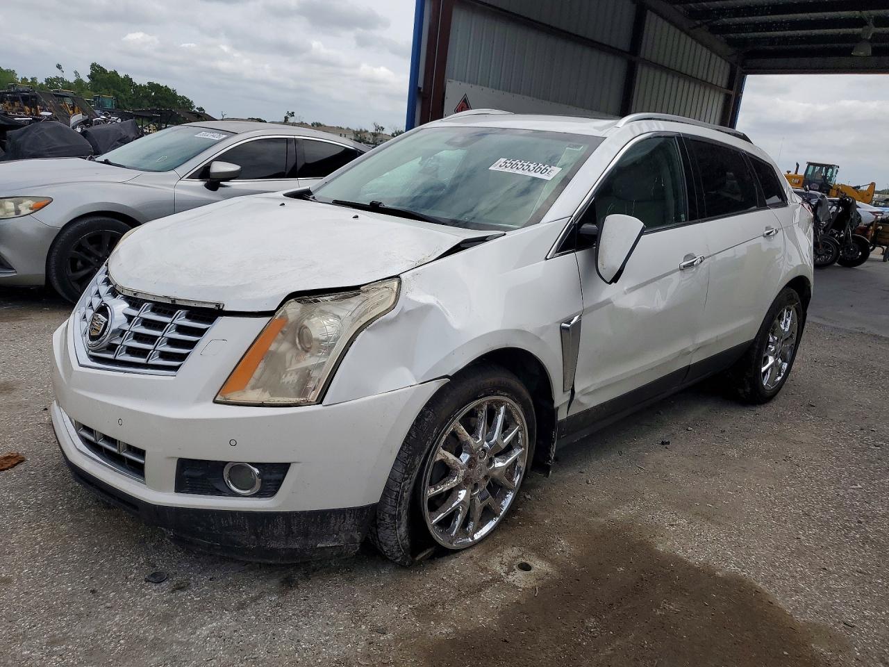2014 Cadillac SRX Premium Collection, VIN 3GYFNDE33ES526235 — Rollover