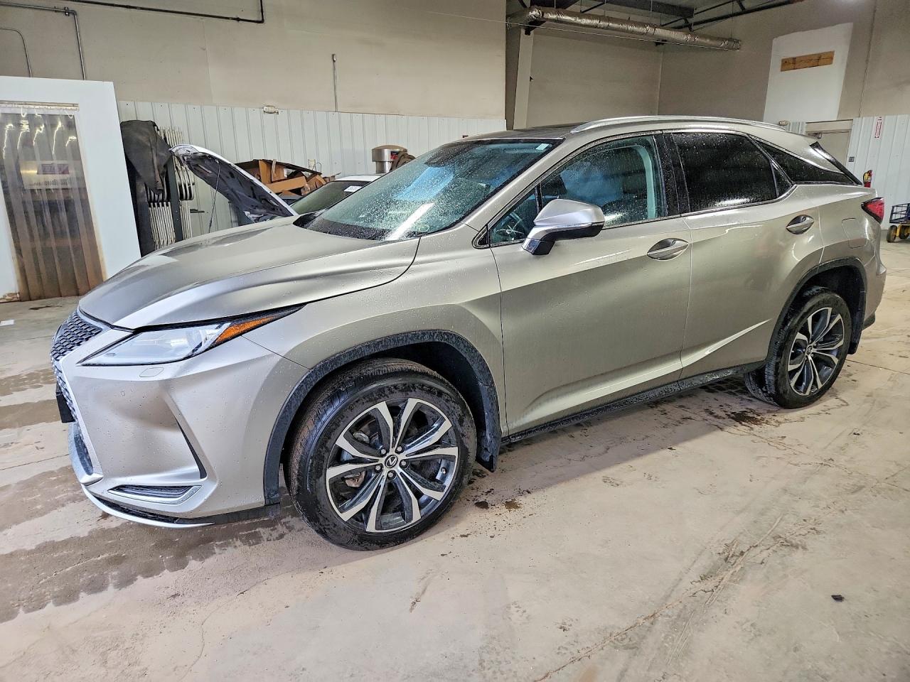 2020 Lexus RX 350, VIN 2T2HZMDA0LC255353 — Side