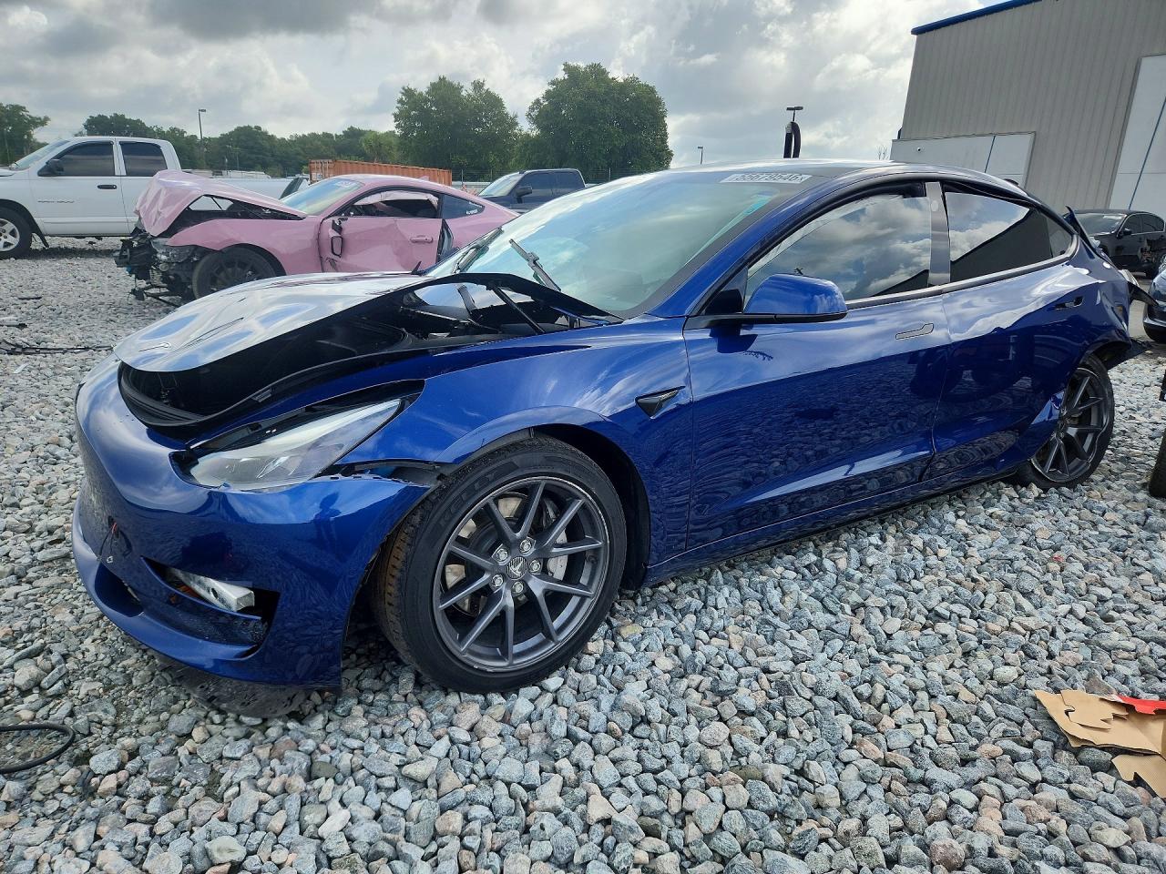 2021 Tesla Model 3 Long Range, VIN 5YJ3E1EB2MF032678 — Front end