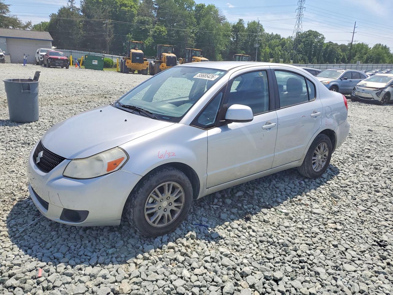 2012 Suzuki SX4 LE, VIN JS2YC5A37C6303784 — Side