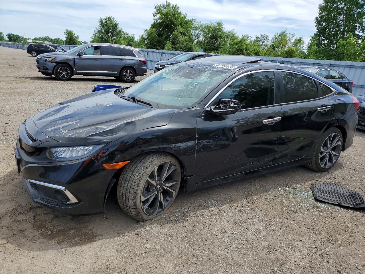 2021 Honda Civic Touring, VIN 2HGFC1F94MH100490 — Rollover