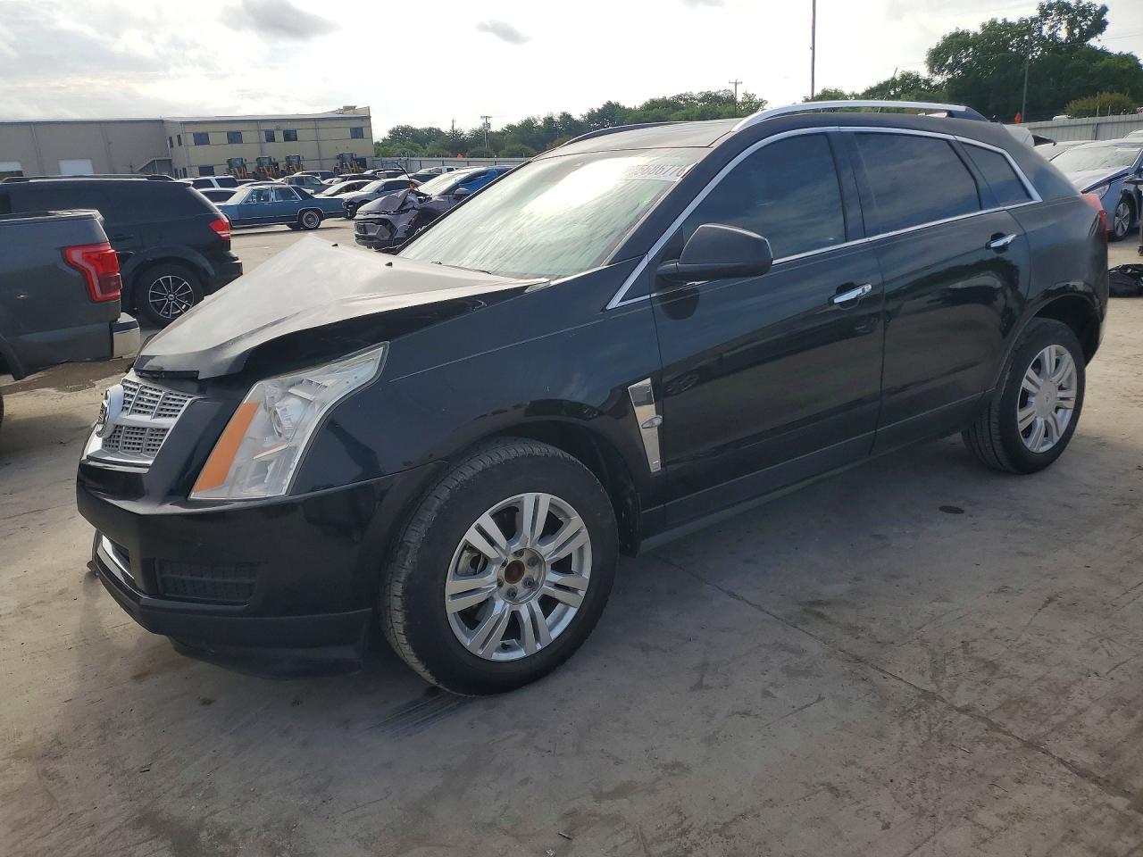 2012 Cadillac SRX Luxury Collection, VIN 3GYFNAE34CS567095 — Front end