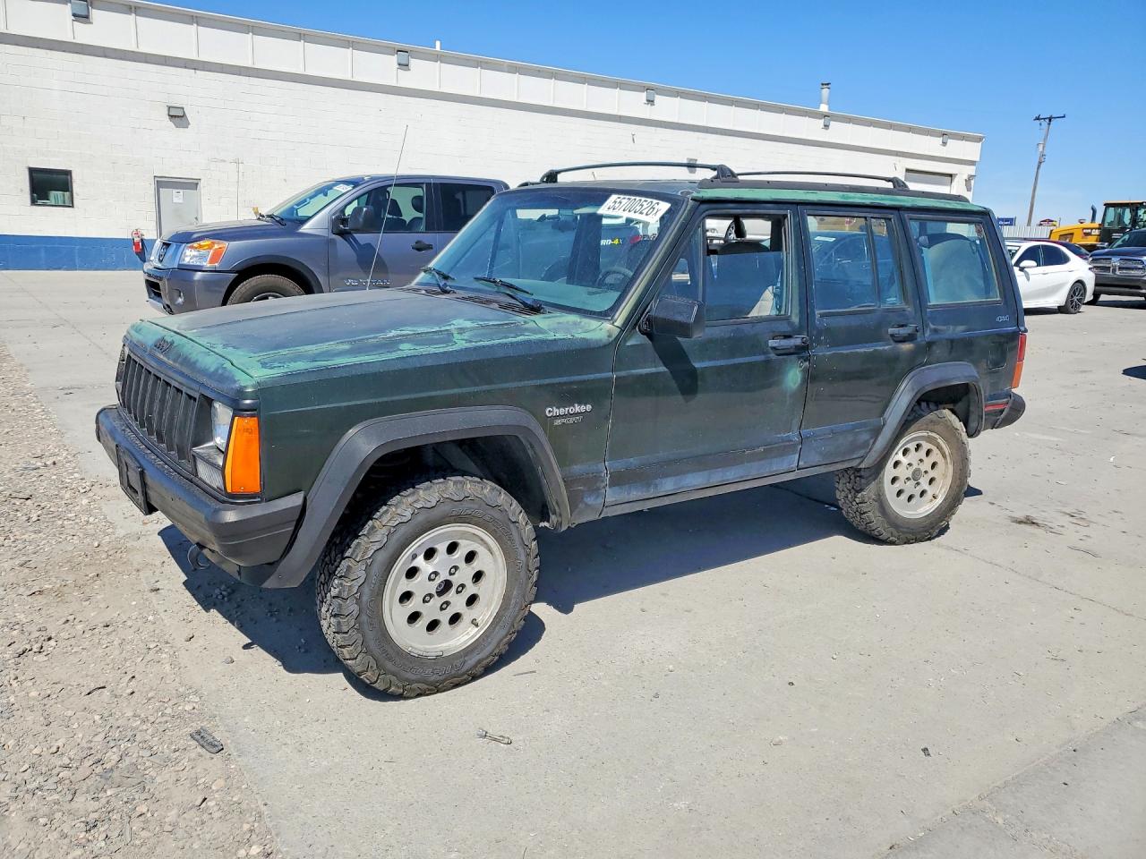 1995 Jeep Cherokee Sport, VIN 1J4FJ68S1SL575784 — Бок