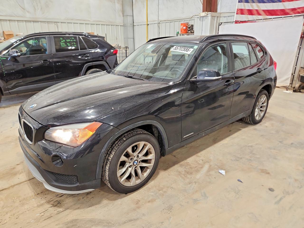 2015 BMW X1 xDrive28i, VIN WBAVL1C53FVY40597 — Front end