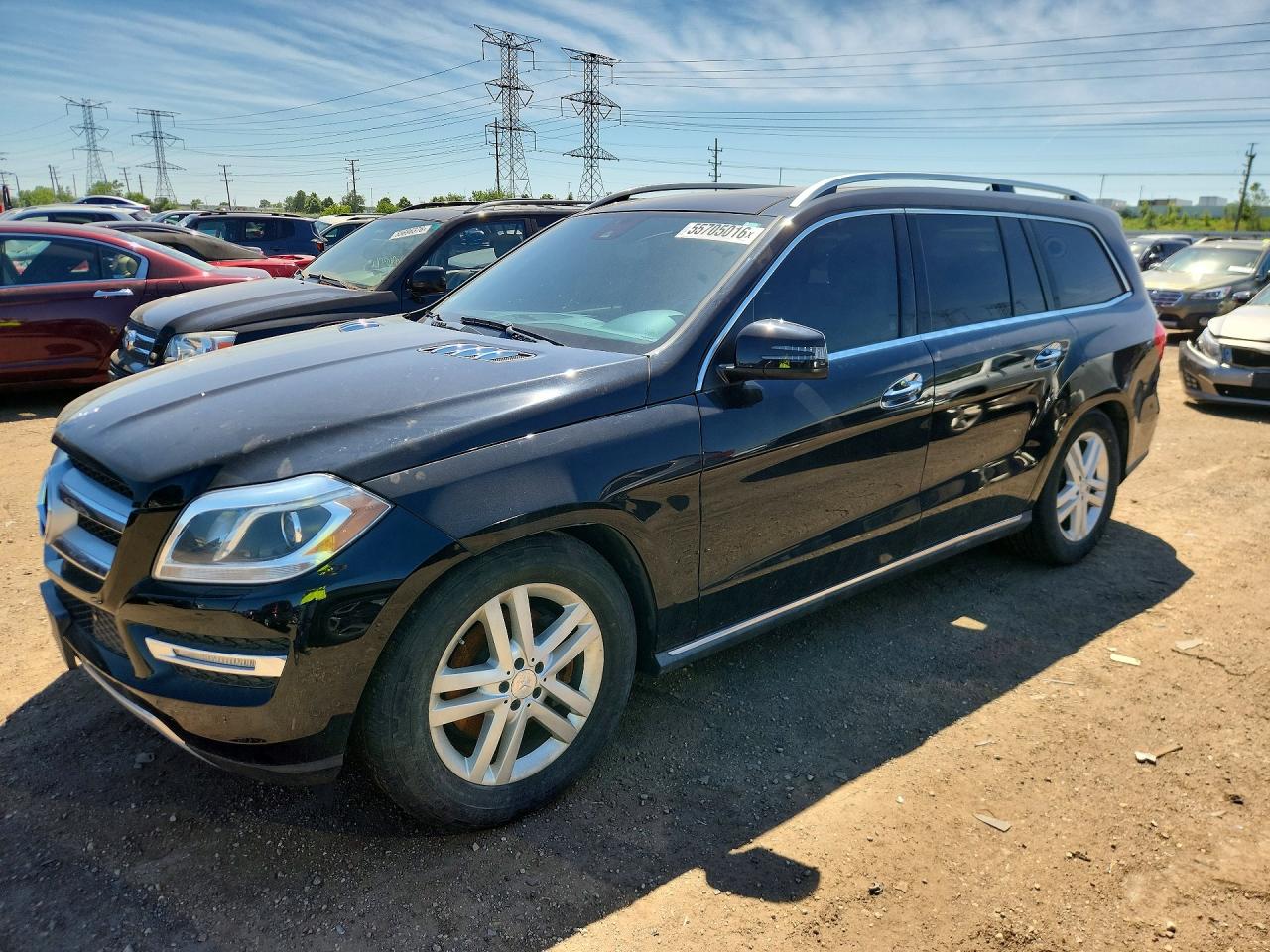 2014 Mercedes-Benz GL 450, VIN 4JGDF7CE8EA395848 — Normal wear