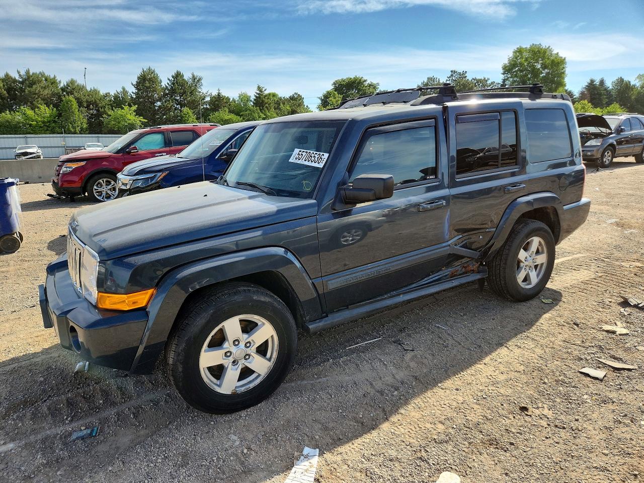 2007 Jeep Commander Sport, VIN 1J8HG48K77C650070 — Side