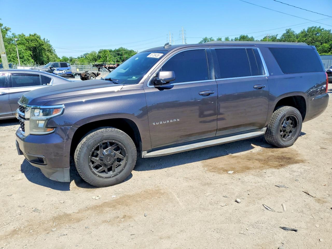2015 Chevrolet Suburban LT, VIN 1GNSKJKC7FR124228 — Minor dents and scratches