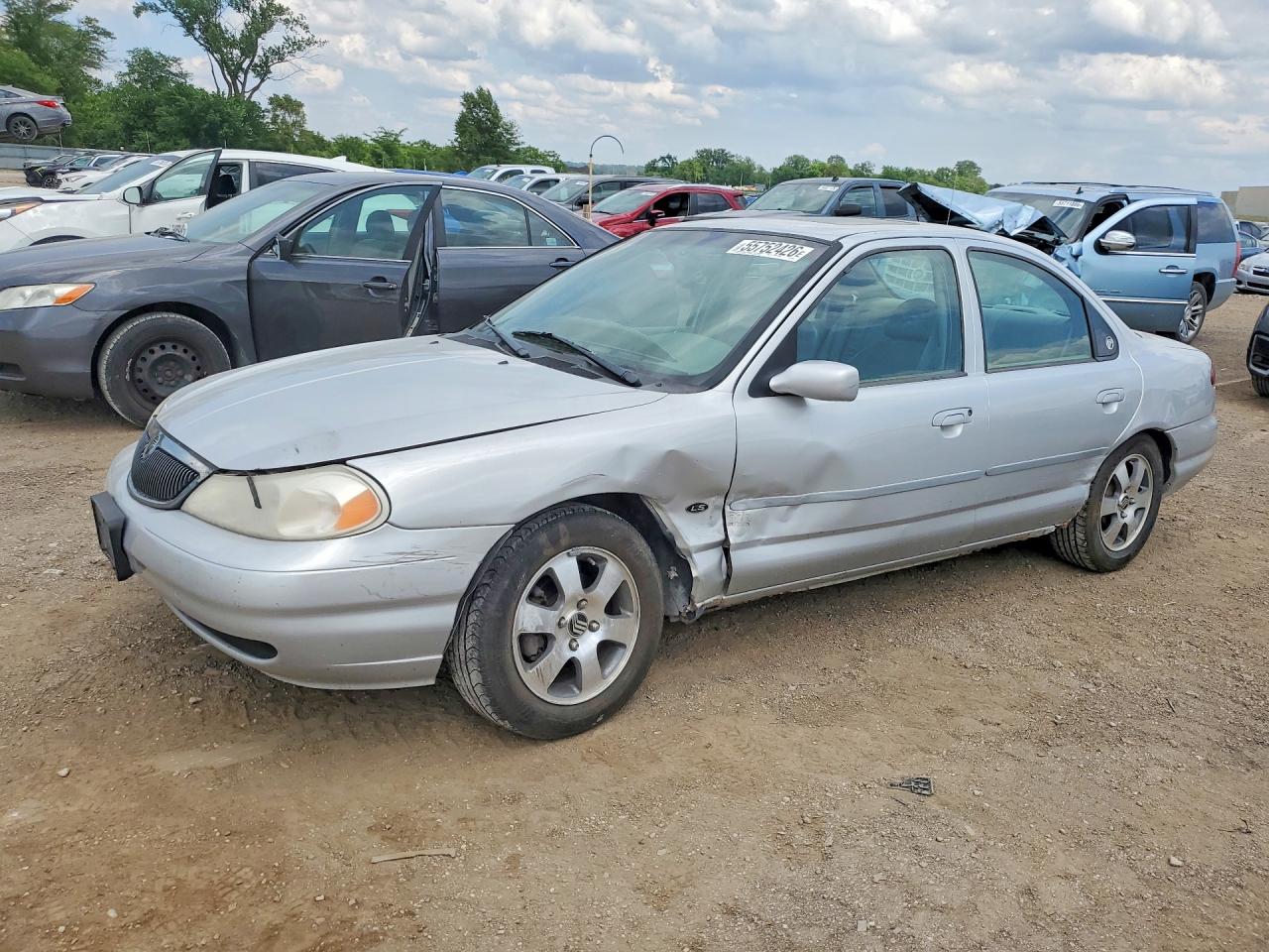 2000 Mercury Mystique, VIN 1MEFM66L9YK600274 — Side