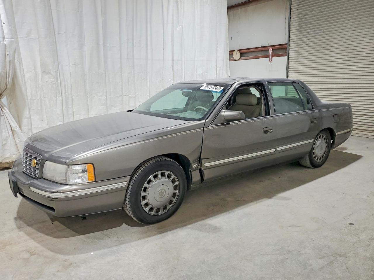 1998 Cadillac DeVille, VIN 1G6KD54Y2WU742222 — Side