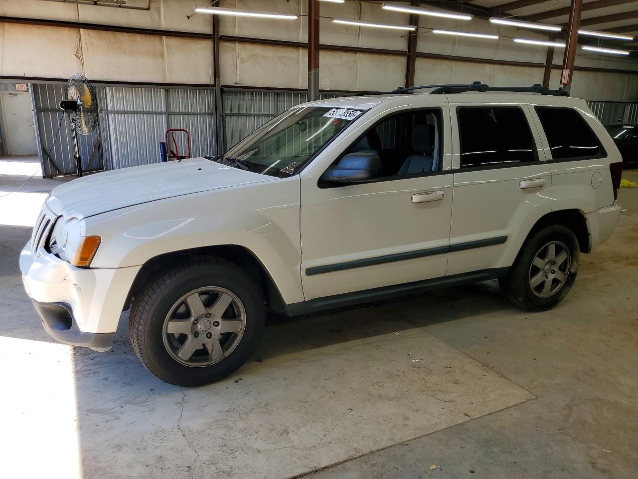 2009 Jeep Grand Cherokee Laredo, VIN 1J8GR48K09C520902 — Rear end
