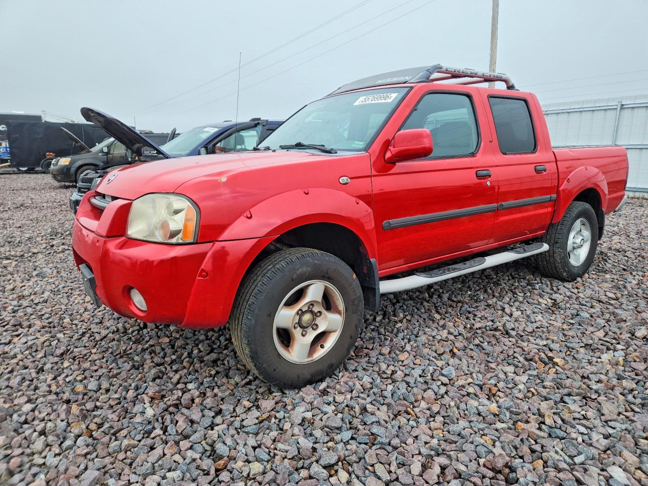 2002 Nissan Frontier SE, VIN 1N6ED27T32C307232 — Hail