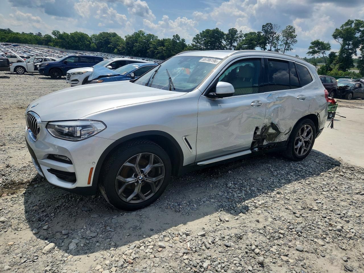2021 BMW X3 sDrive30i, VIN 5UXTY3C04M9H67324 — Side