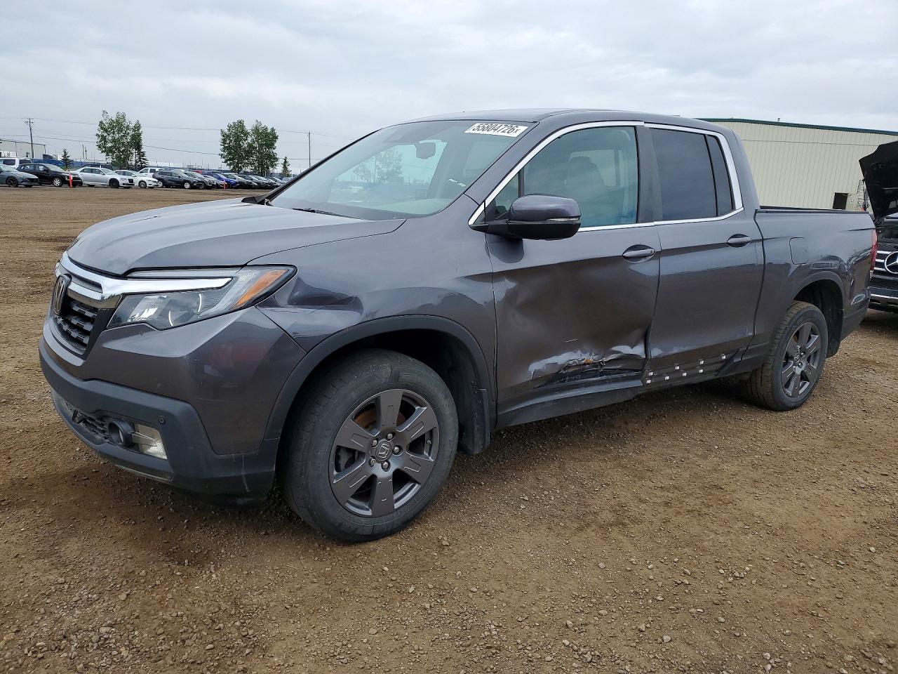 2020 Honda Ridgeline RTL, VIN 5FPYK3F51LB501185 — Side