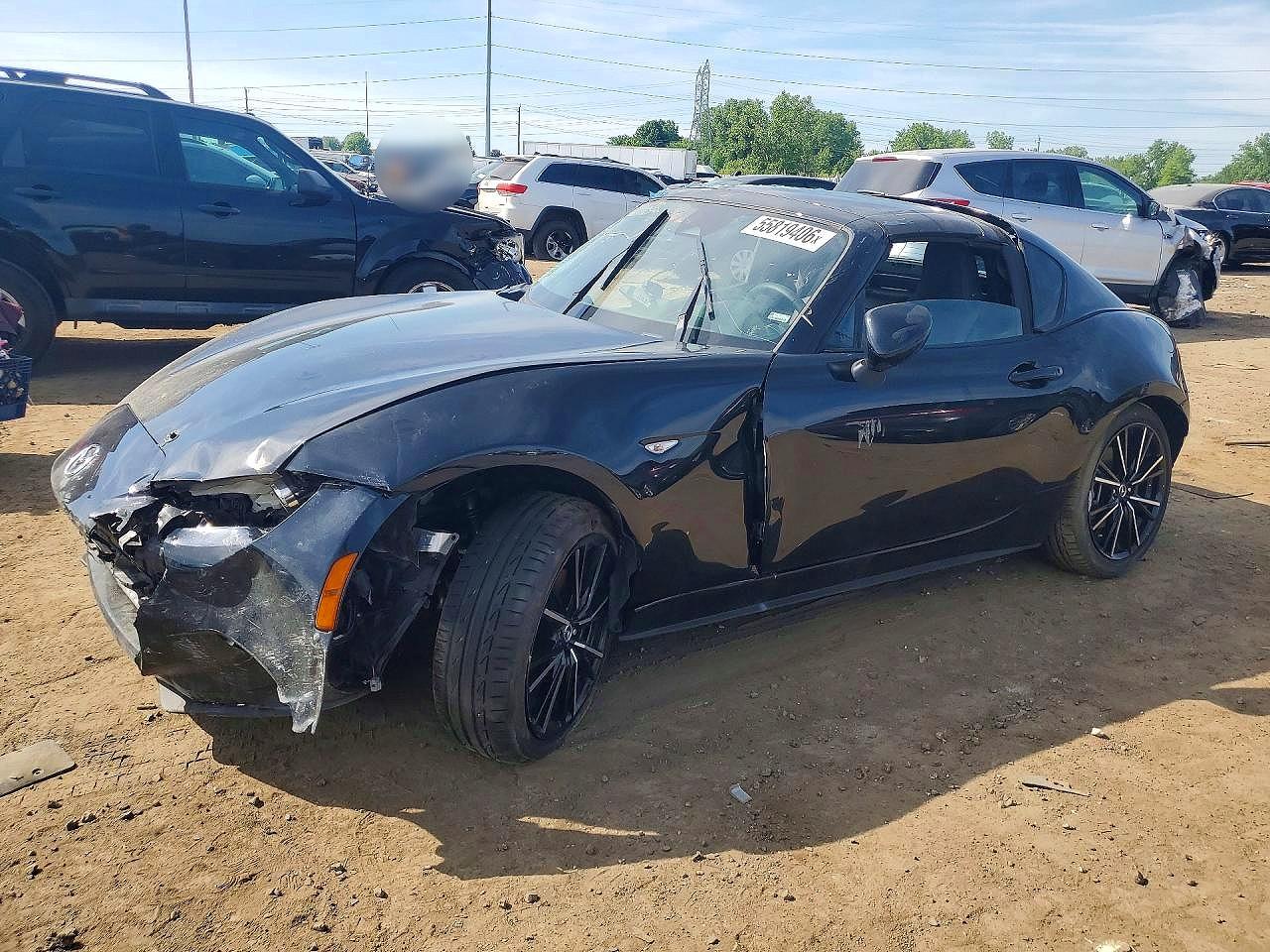 2025 Mazda MX-5 Miata Grand Touring, VIN JM1NDAM71S0652703 — Бок