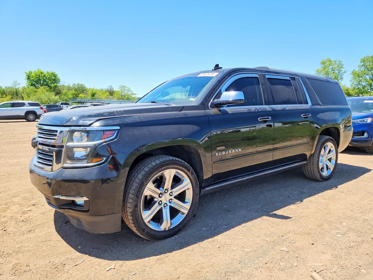 2017 Chevrolet Suburban Premier, VIN 1GNSKJKCXHR408259 — Hail