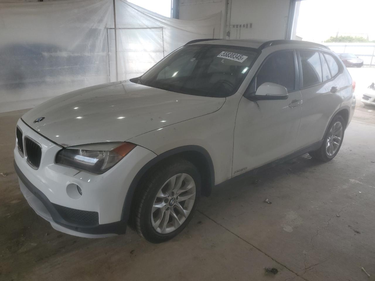 2015 BMW X1 xDrive28i, VIN WBAVL1C59FVY40829 — Normal wear