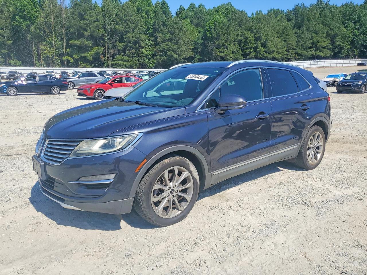 2015 Lincoln MKC, VIN 5LMTJ2AH7FUJ07146 — Minor dents and scratches