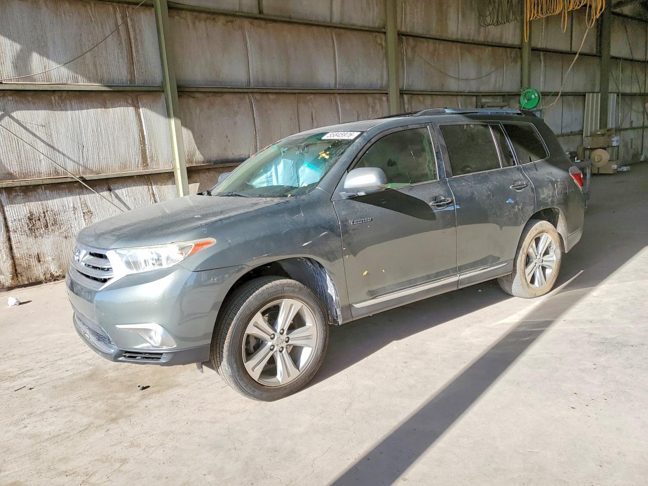2012 Toyota Highlander Limited, VIN 5TDDK3EH5CS131986 — Side