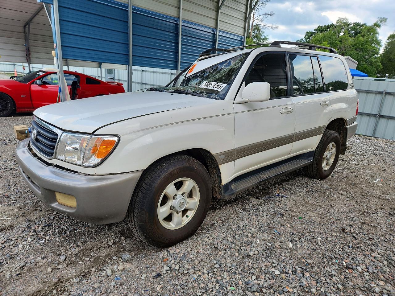 1999 Toyota Land Cruiser, VIN JT3HT05J5X0067641 — Front end