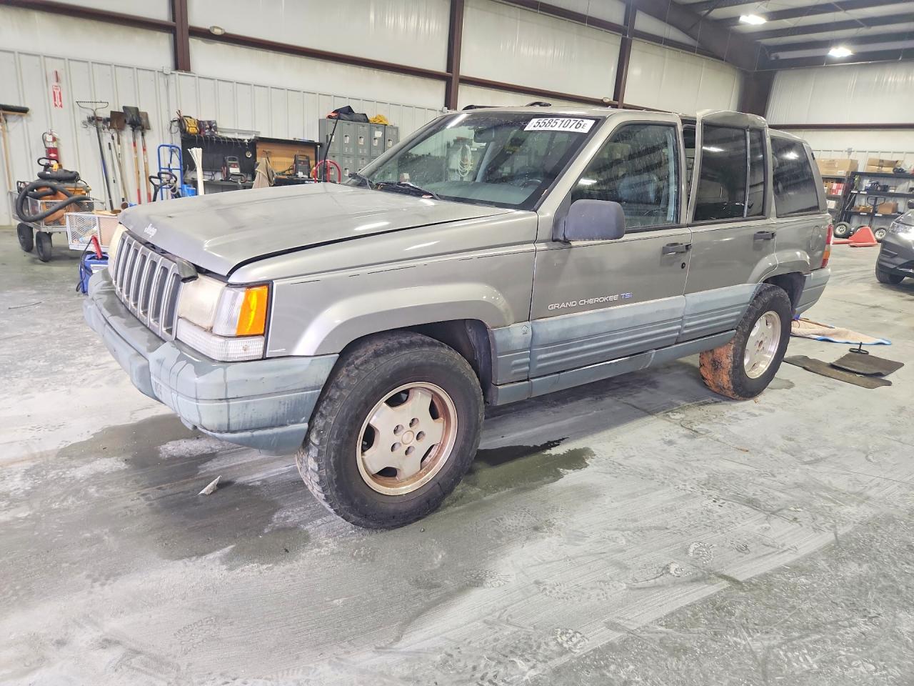 1997 Jeep Grand Cherokee Laredo, VIN 1J4GZ58Y0VC711855 — Side