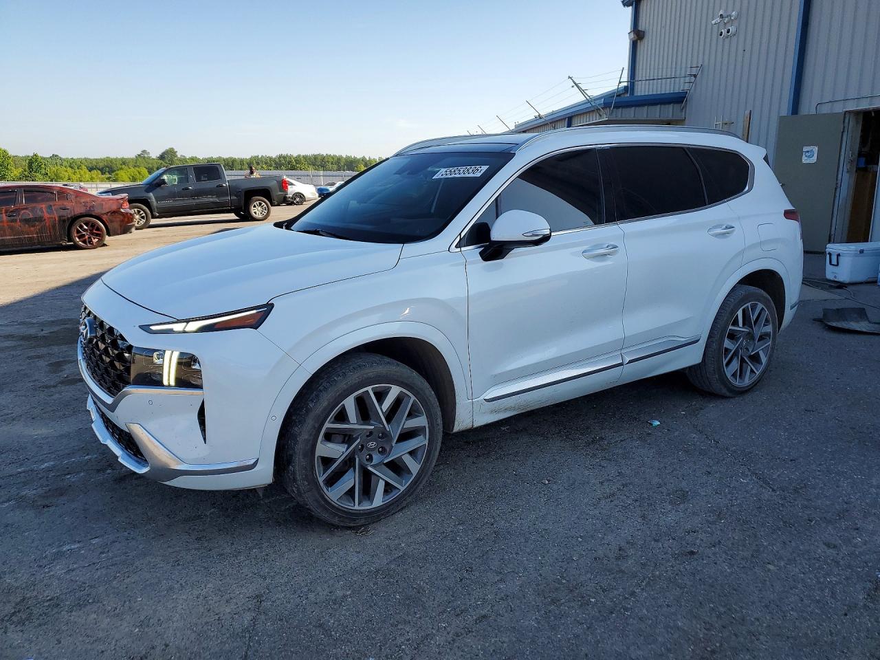 2022 Hyundai Santa Fe Calligraphy, VIN 5NMS54AL8NH416685 — Мелкие вмятины и царапины