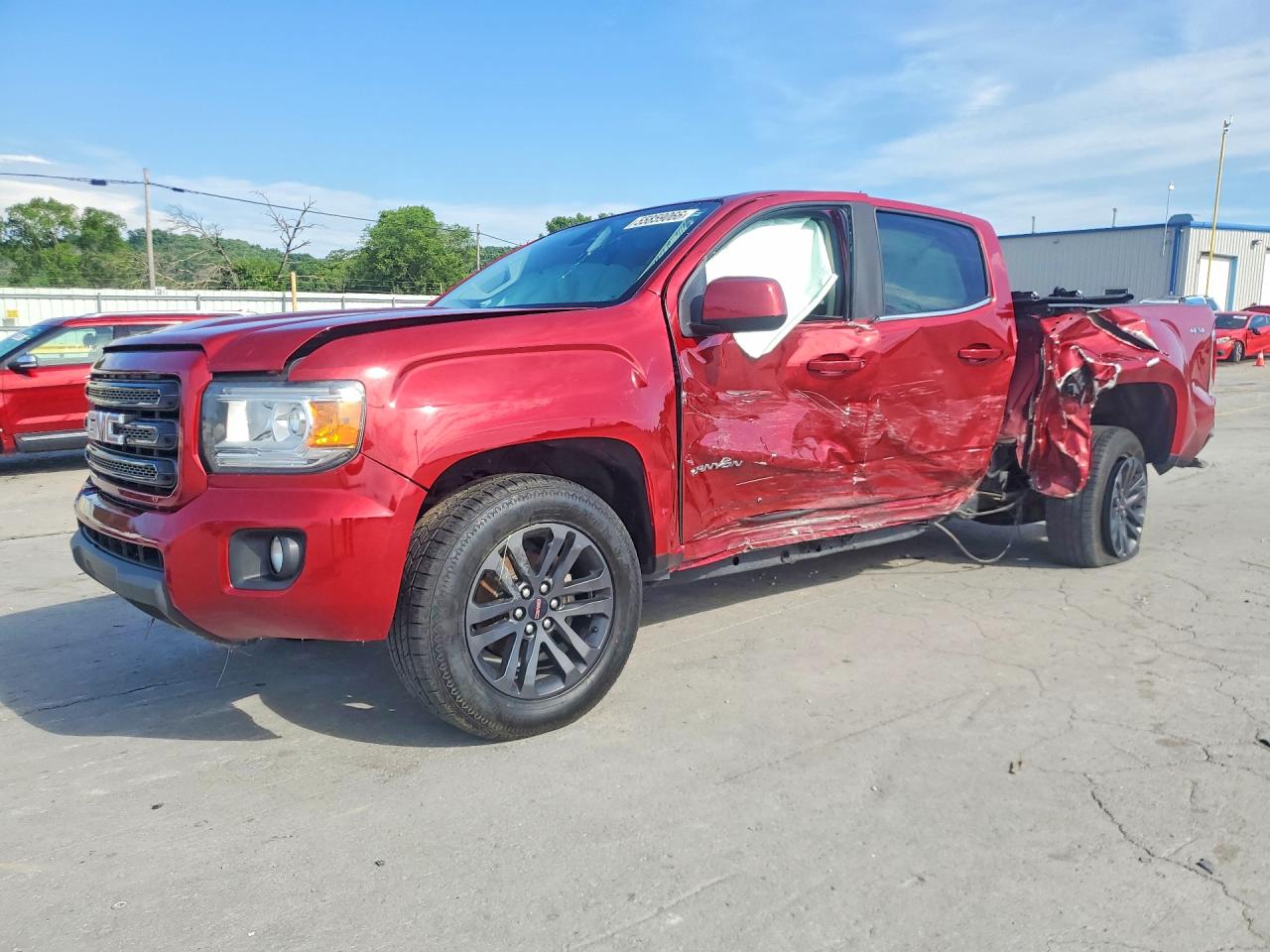 2020 GMC Canyon 4WD SLE, VIN 1GTG6CEN7L1135798 — Side