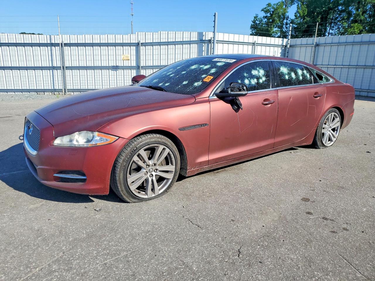 2013 Jaguar XJ Portfolio, VIN SAJWJ2GDXD8V47426 — Vandalism