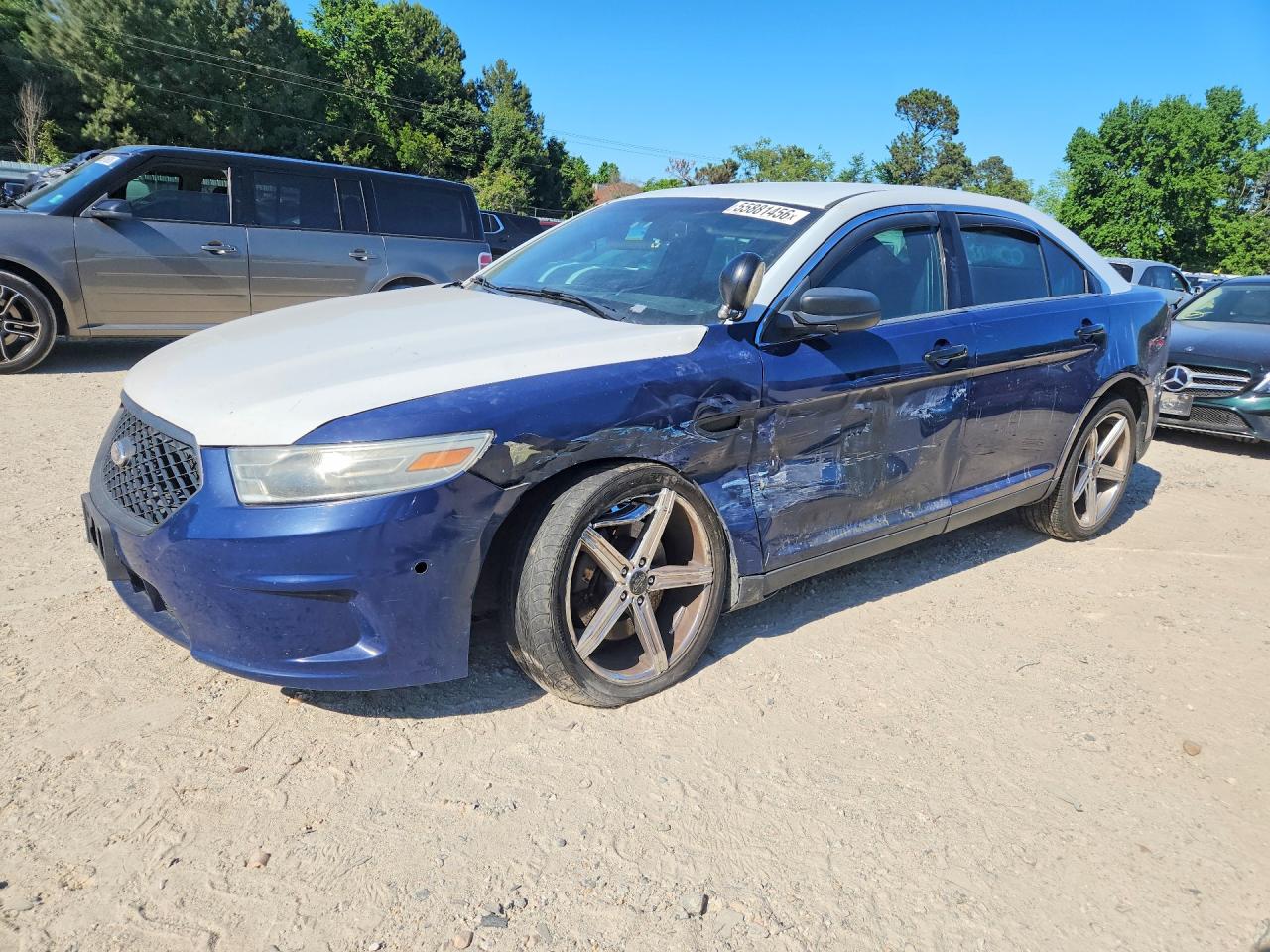 2014 Ford Police Interceptor, VIN 1FAHP2MK0EG103123 — Side