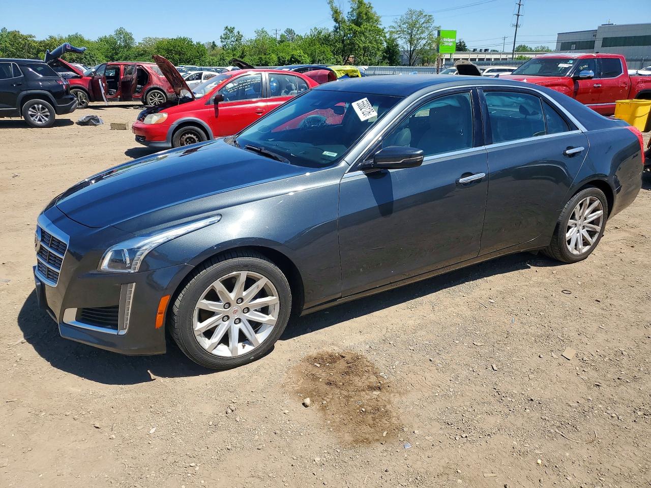 2014 Cadillac CTS Luxury AWD, VIN 1G6AX5SX0E0128417 — Side