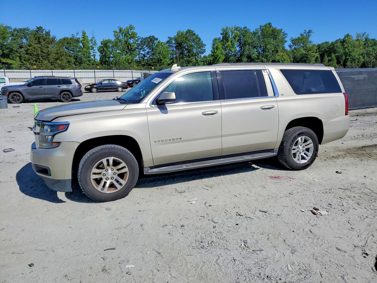 2015 Chevrolet Suburban LT, VIN 1GNSCJKC3FR609933 — Rear end