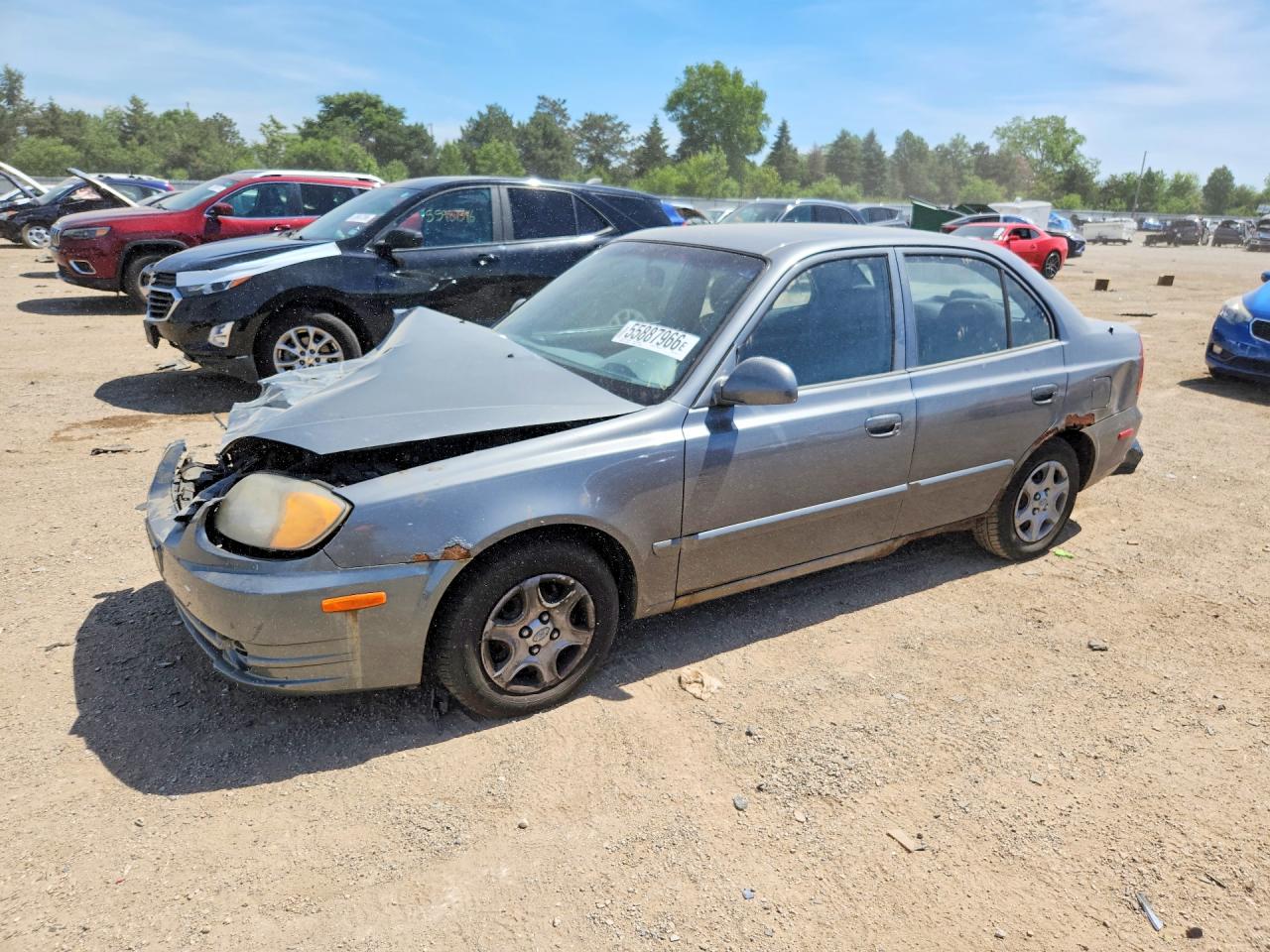 2004 Hyundai Accent GL, VIN KMHCG45C04U572411 — Front end