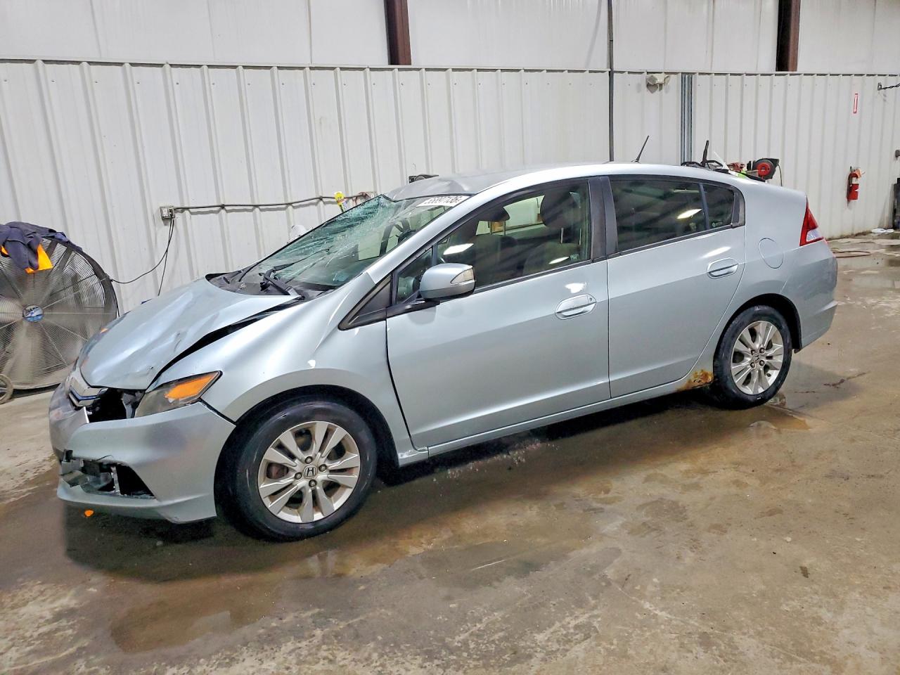 2013 Honda Insight EX, VIN JHMZE2H71DS004329 — Side