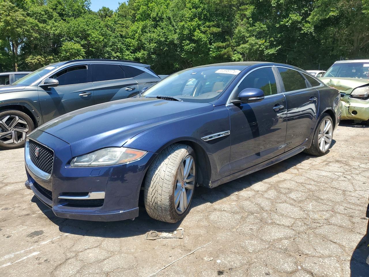 2017 Jaguar XJ R-Sport, VIN SAJWA1C76H8W10554 — Side