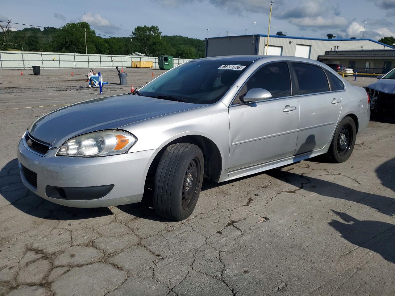2014 Chevrolet Impala Police Police, VIN 2G1WD5E31E1186571 — Side