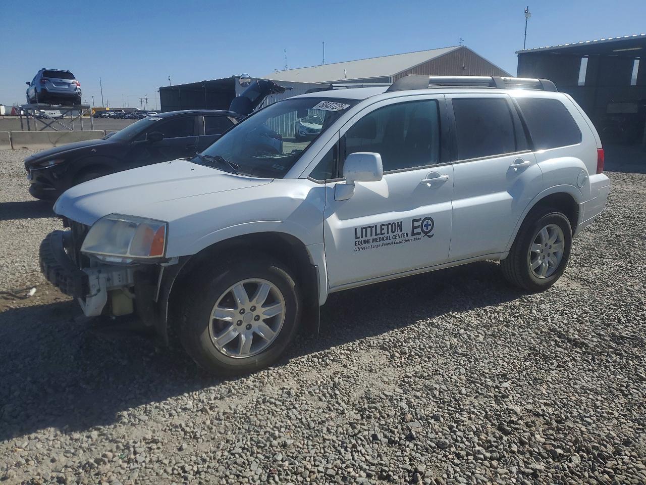 2011 Mitsubishi Endeavor LS, VIN 4A4JN2AS7BE031004 — Side