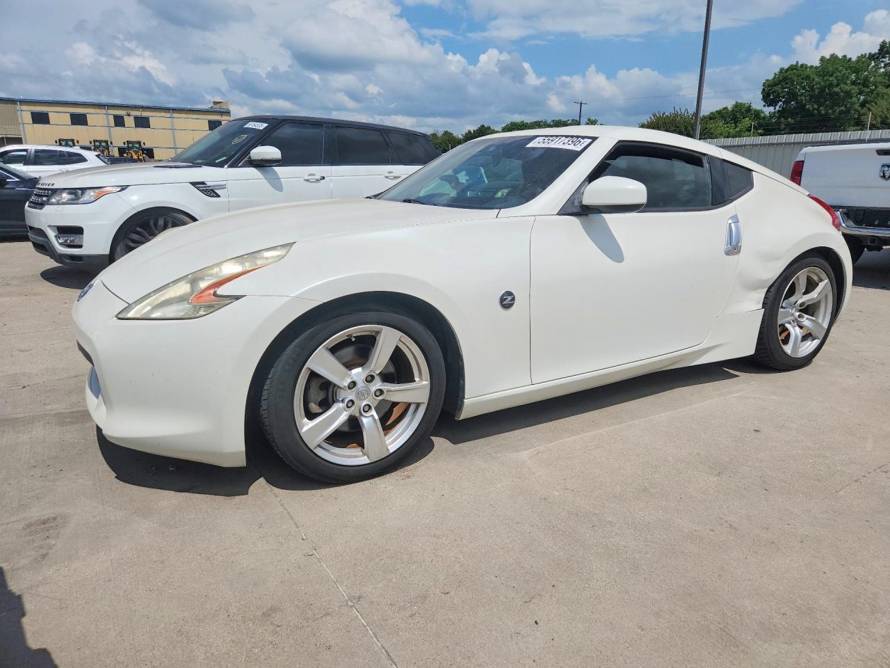2011 Nissan 370Z Nismo, VIN JN1AZ4EH6BM550530 — Hail