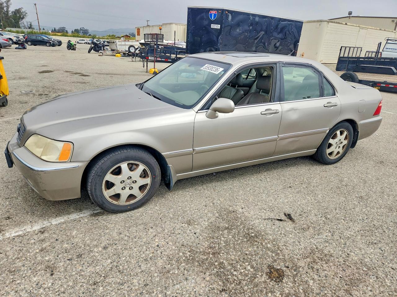2002 Acura RL, VIN JH4KA96592C015495 — Side