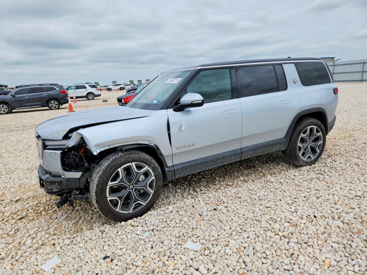 2025 Rivian R1S Adventure, VIN 7PDSGBBA2SN052850 — Side