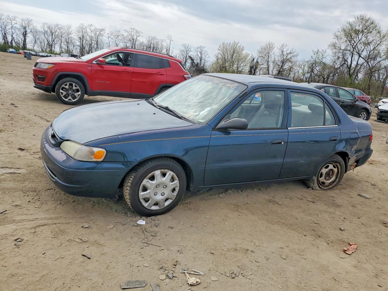 1999 Toyota Corolla CE, VIN 2T1BR12E6XC249318 — Undercarriage