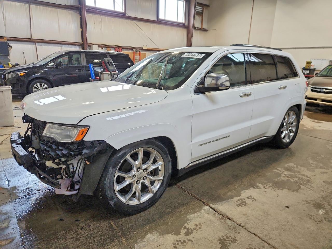 2014 Jeep Grand Cherokee Summit, VIN 1C4RJFJM7EC394594 — Auction photo