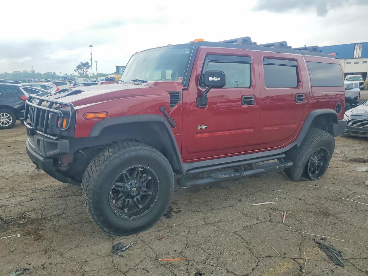 2004 Hummer H2, VIN 5GRGN23UX4H111221 — Undercarriage