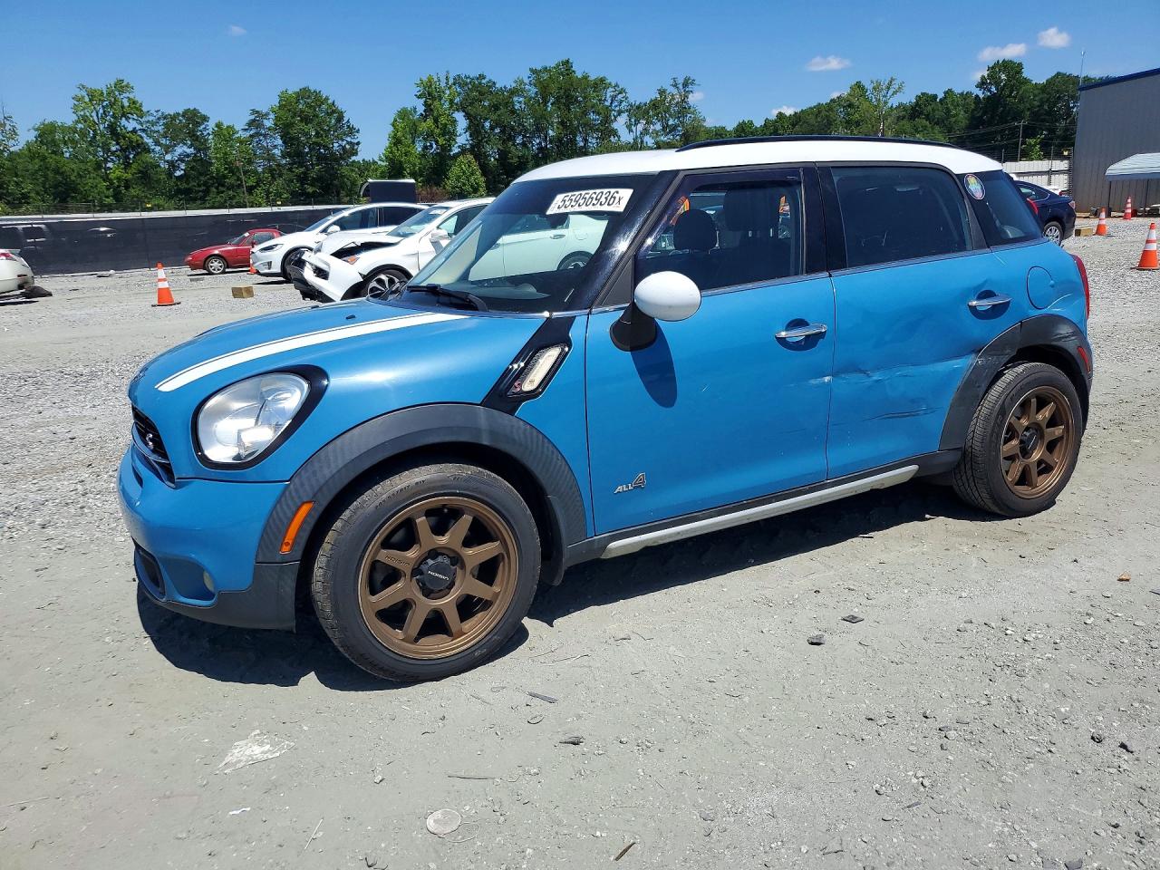2016 MINI Countryman S, VIN WMWZC5C57GWU20524 — Side