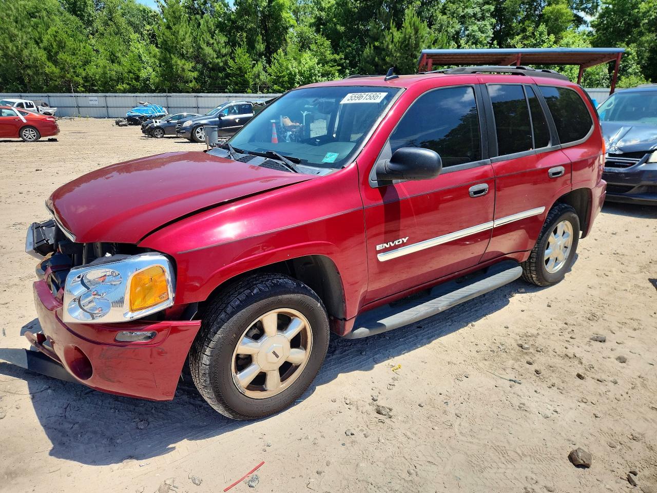 2006 GMC Envoy SLE, VIN 1GKDS13S962263703 — Front end
