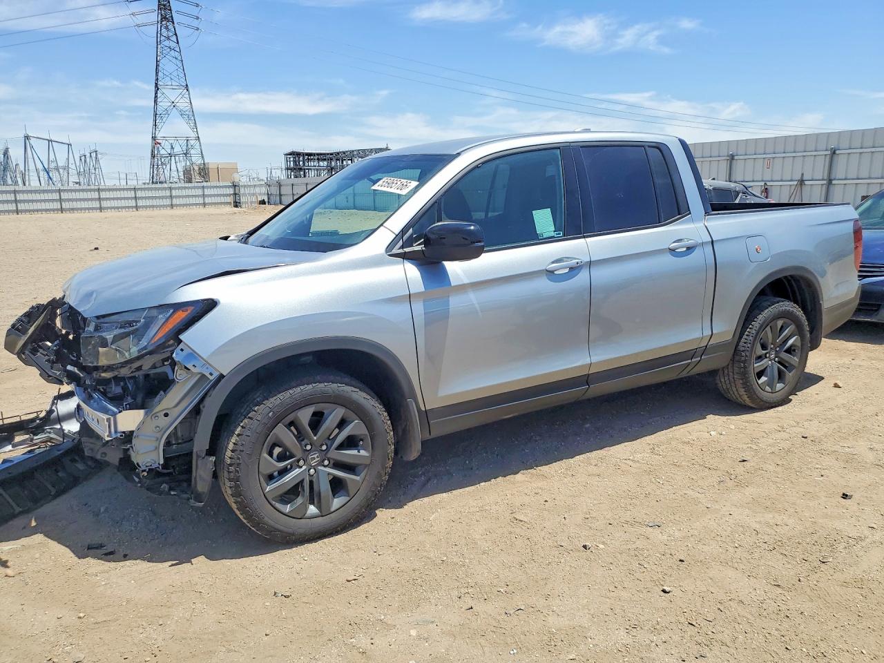 2026 Honda Ridgeline Sport, VIN 5FPYK3F10TB028036 — Front end